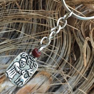 Saint Francis of Assisi with brown glass bead